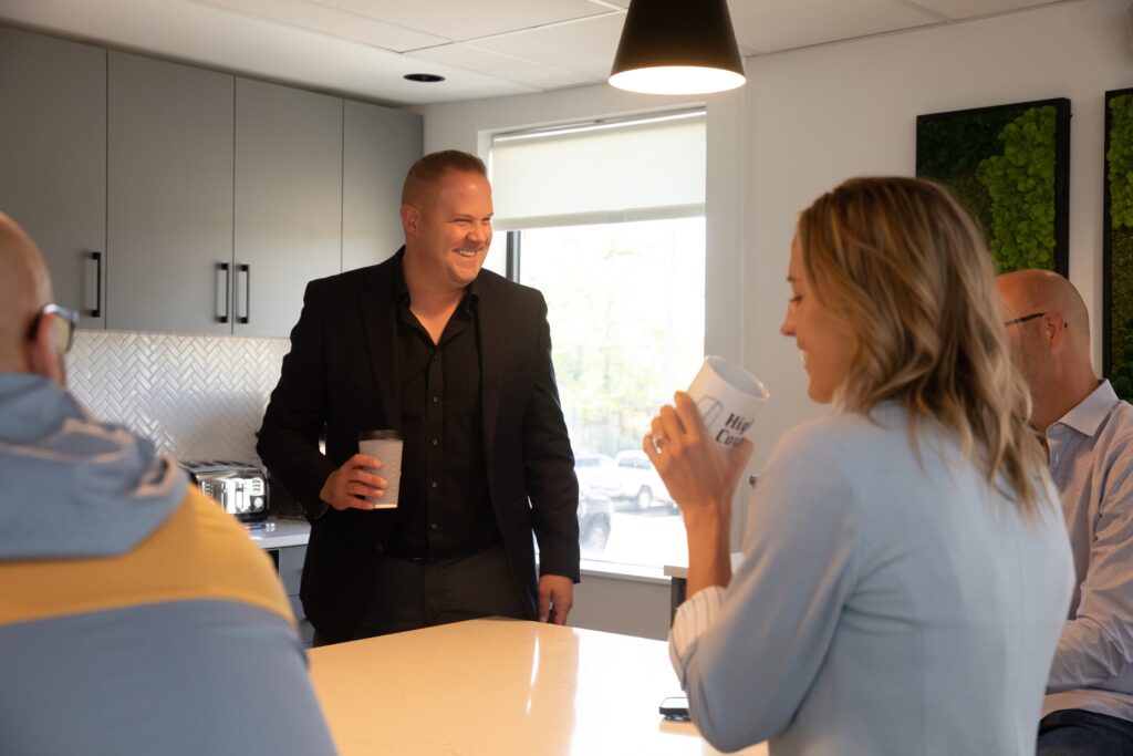 Picture of recruiters drinking coffee and laughing